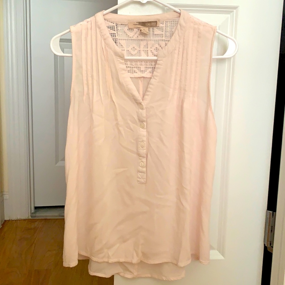 Sleeveless pink blouse